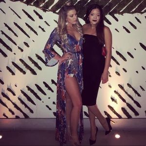 FLORAL HIGH LOW ROMPER SHORTS SIZE MEDIUM